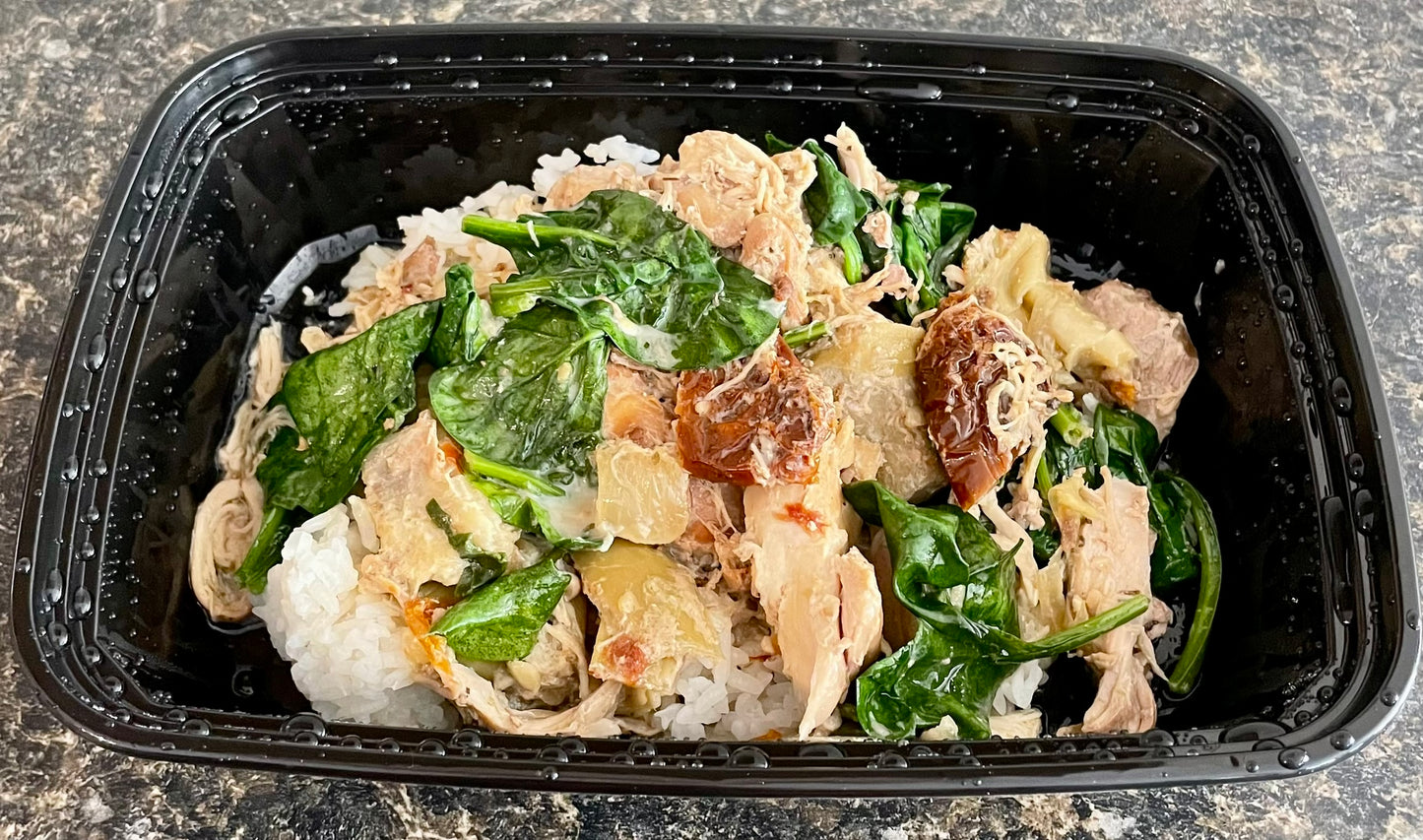 Tuscan Chicken with Artichoke Hearts and Sun-Dried Tomatoes over Rice