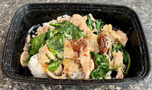 Tuscan Chicken with Artichoke Hearts and Sun-Dried Tomatoes over Rice